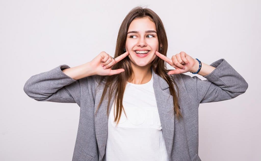 Young patient with a confident, bright smile